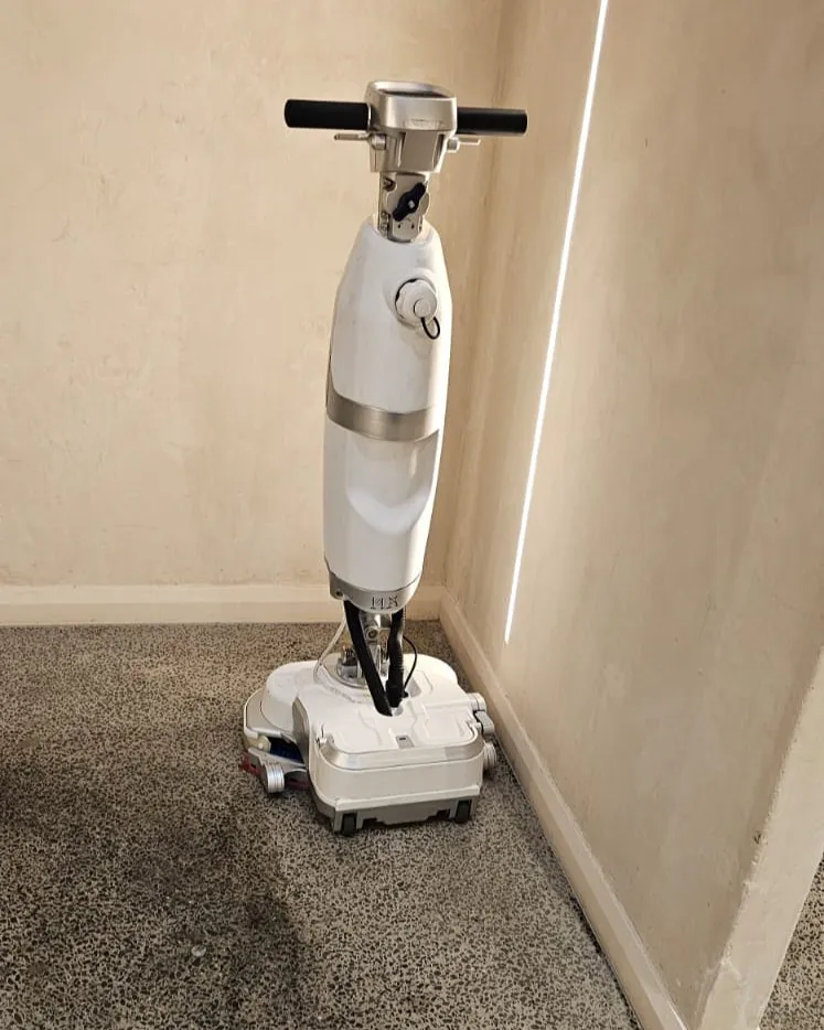 Conquest HDS46 walk-behind floor scrubber designed for cleaning narrow indoor spaces and confined areas