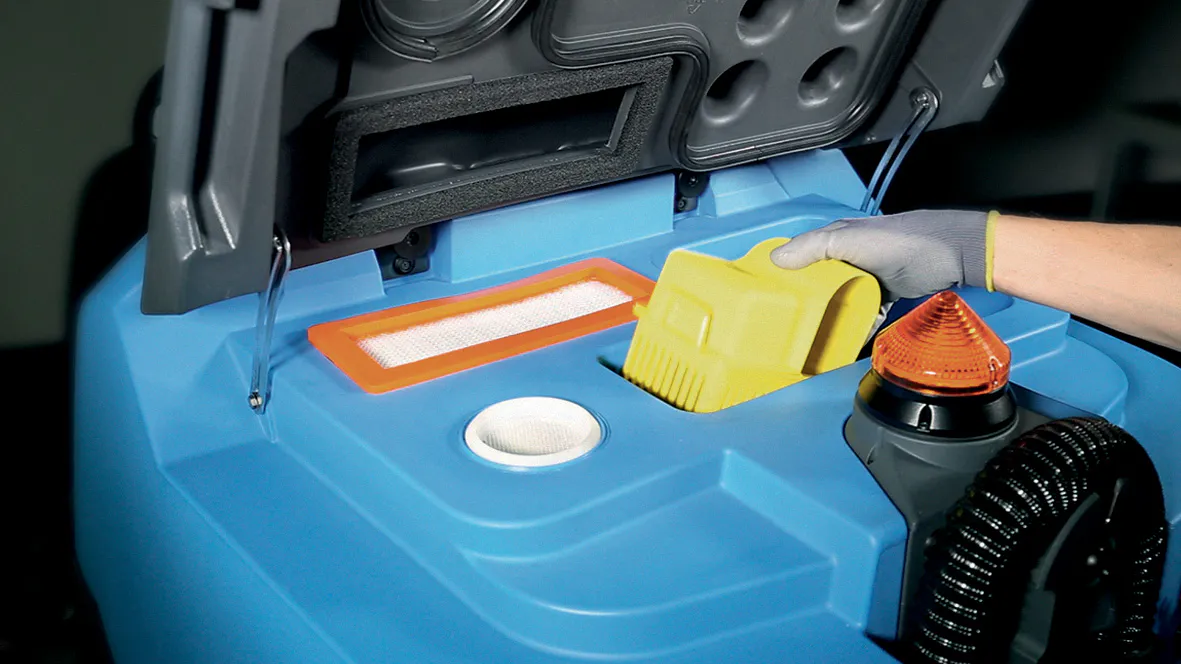 Conquest HDS90 Ride-On Industrial Scrubber featuring the Drain Saver filtration system for simplified debris collection and easier maintenance