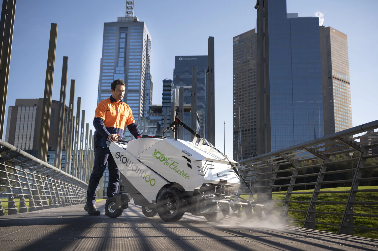 Conquest HDSW100 electric street washer cleaning a pedestrian walkway with low-noise, zero-emission performance