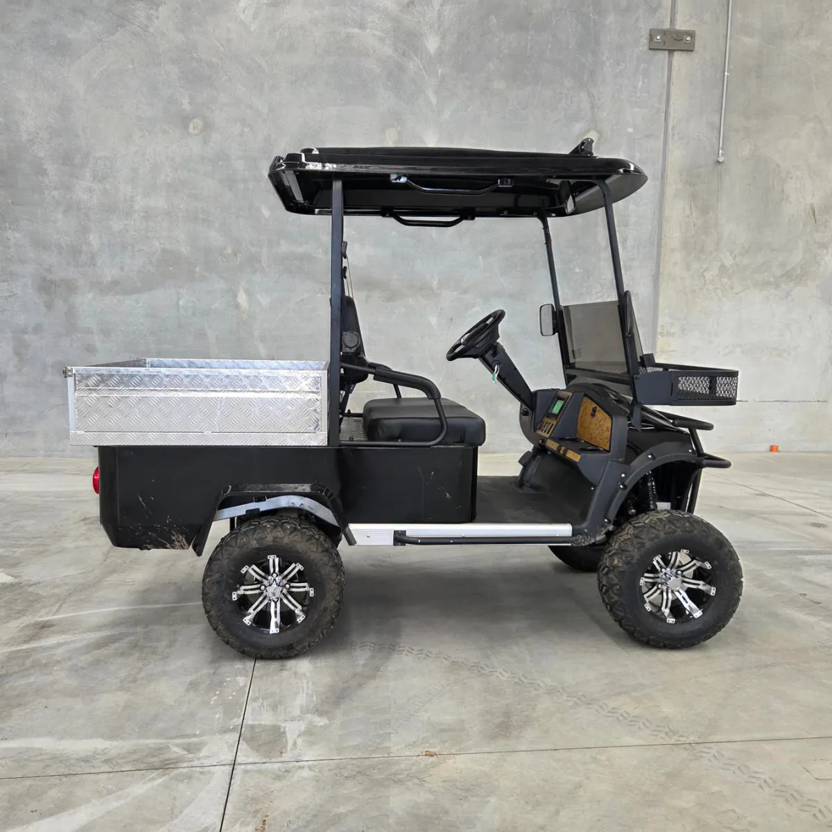 Conquest HDUV200 utility task vehicle with all-terrain tyres and aluminium cargo tray for demanding industrial environments